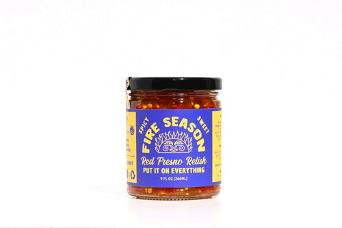 Jar of Fire Season Red Fresno relish with a blue label on a white background. Sweet,  spicy, pickled condiment. Best chili, best relish.
